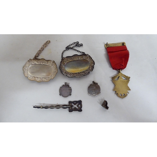 102 - Silver items, mainly spoons and napkin rings  (combined gross weight approx. 8.5ozs)