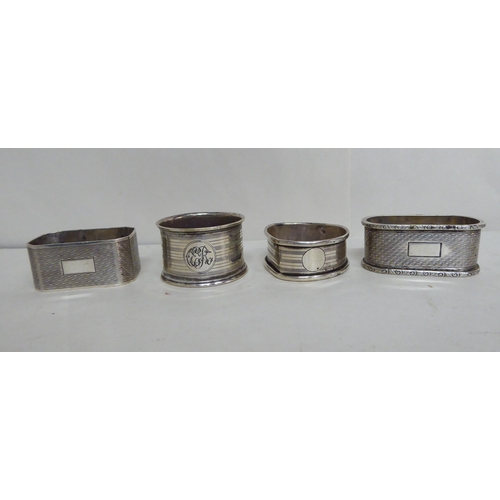 102 - Silver items, mainly spoons and napkin rings  (combined gross weight approx. 8.5ozs)