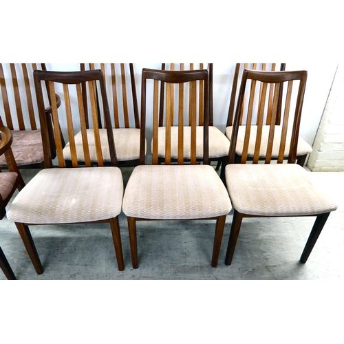 105 - A set of eight G-Plan teak framed dining chairs with upholstered seats, raised on square, tapered le... 