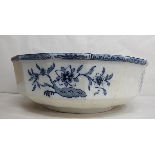 106 - A late Victorian A.Bros Oriental china wash bowl; and matching jug, decorated in blue and white