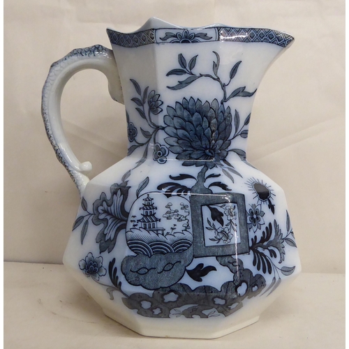 106 - A late Victorian A.Bros Oriental china wash bowl; and matching jug, decorated in blue and white