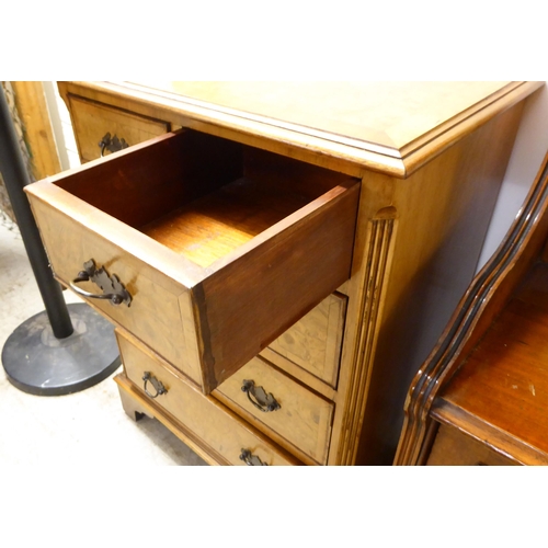 17 - Furniture: to include a walnut veneered and mahogany five drawer bedside chest, raised on bracket fe... 