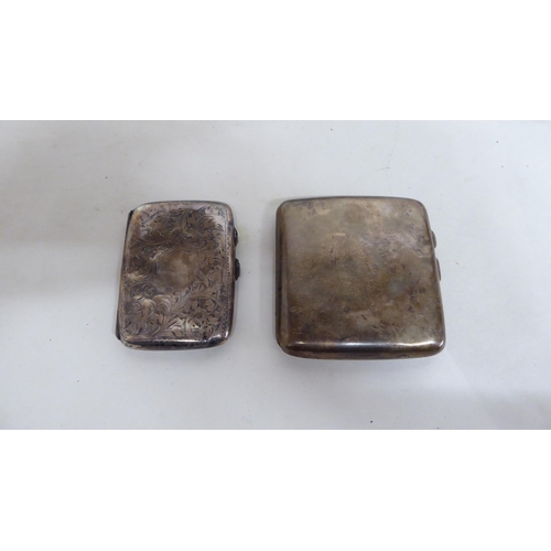 2 - Silver items: to include two bangles; and two cigarette cases  mixed marks  (approx. 5ozs ... 