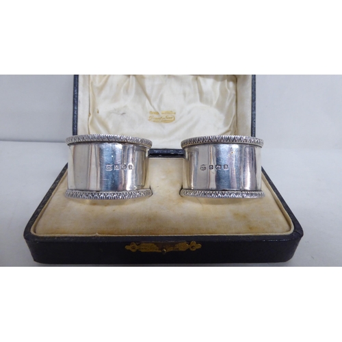 2 - Silver items: to include two bangles; and two cigarette cases  mixed marks  (approx. 5ozs ... 