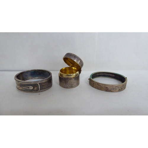 2 - Silver items: to include two bangles; and two cigarette cases  mixed marks  (approx. 5ozs ... 