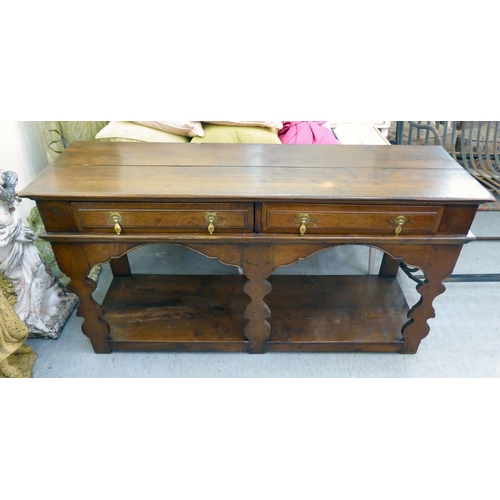 270 - A modern Georgian design oak dresser base with two drawers, on a platform base  27