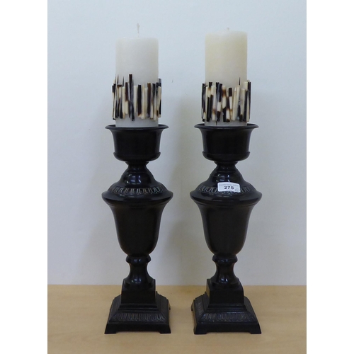 275 - A pair of modern black painted cast metal candlestands  14