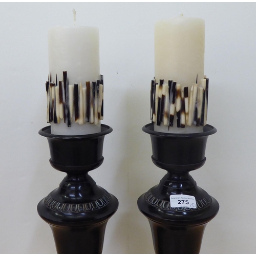 275 - A pair of modern black painted cast metal candlestands  14