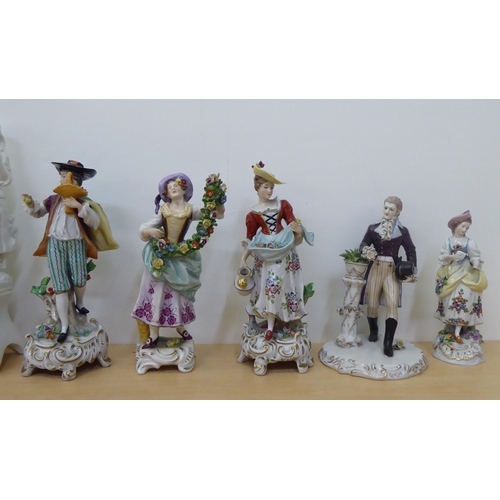 278 - Eight 20thC Chinese and European porcelain figures, in traditional attire  largest 8