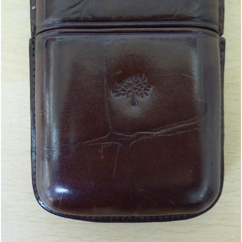 280 - A Mulberry two-part brown hide cigar sleeve, accommodating three cigars