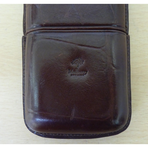 280 - A Mulberry two-part brown hide cigar sleeve, accommodating three cigars