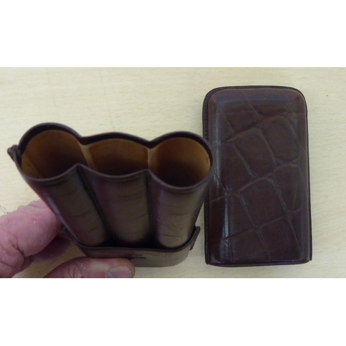 280 - A Mulberry two-part brown hide cigar sleeve, accommodating three cigars