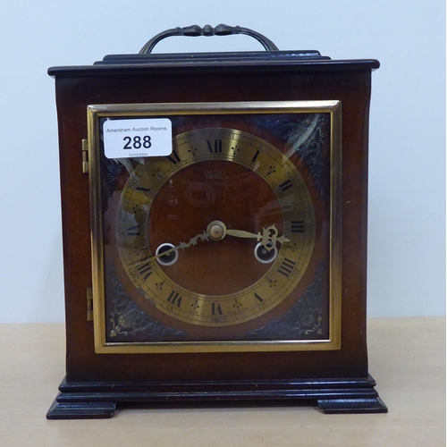 288 - A modern Smiths of Enfield mahogany cased mantel clock, on bracket feet; faced by a Roman dial  8