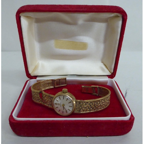 3 - A lady's Omega 9ct gold cased and strapped wristwatch  (approx.15g gross weight)