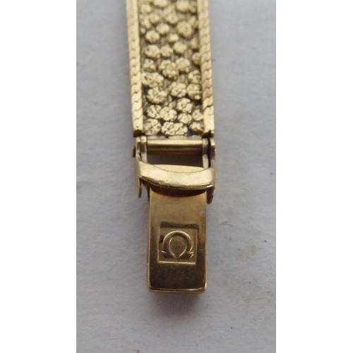 3 - A lady's Omega 9ct gold cased and strapped wristwatch  (approx.15g gross weight)