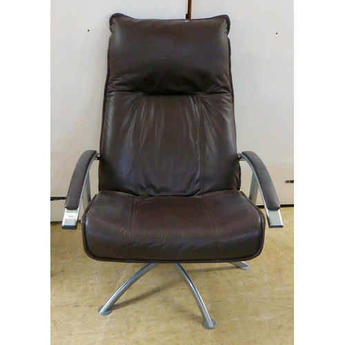 366 - A modern Hornselet, Denmark, reclining chair with a cast metal frame and stitched dark brown hide up... 