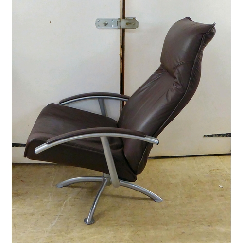 367 - A modern Hornselet, Denmark, reclining chair with a cast metal frame and stitched dark brown hide up... 