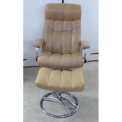 368 - A modern reclining chair, the chromium plated frame with cafe au lait coloured hide upholstery; and ... 