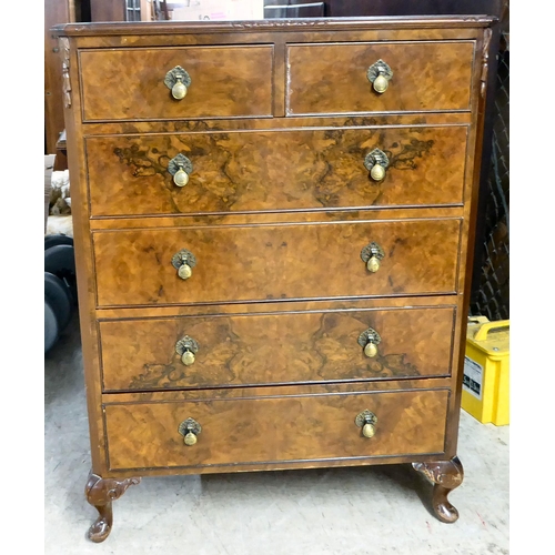 369 - A mid 20thC quarter veneered and walnut finished six drawer dressing chest, raised on stubby, carved... 