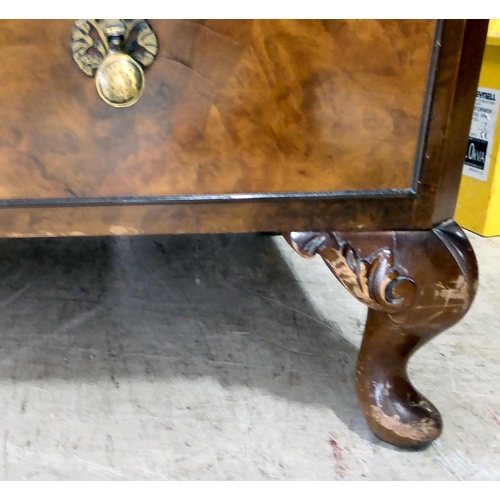 369 - A mid 20thC quarter veneered and walnut finished six drawer dressing chest, raised on stubby, carved... 