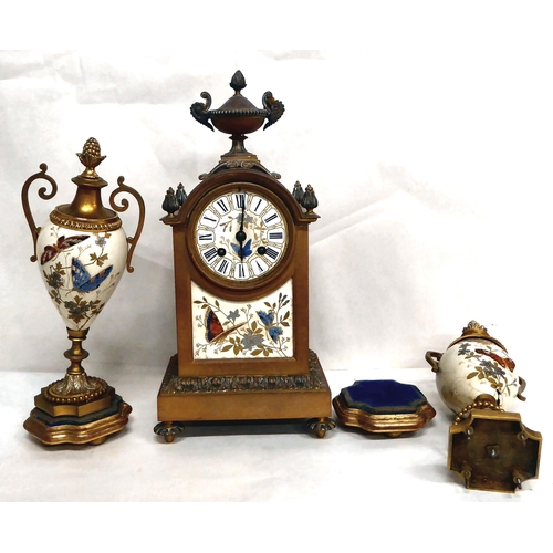 373 - An early/mid 20thC brass cased, three piece clock garniture; the movement faced by a porcelain Roman... 