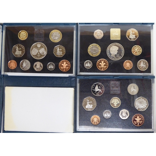 377 - A consecutive run of cased Royal Mint proof coin sets from 1990-1999