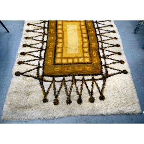 380 - A Swedish Rya rug  circa 1960s, decorated with a central rectangular panel, bordered by 'A' rep... 