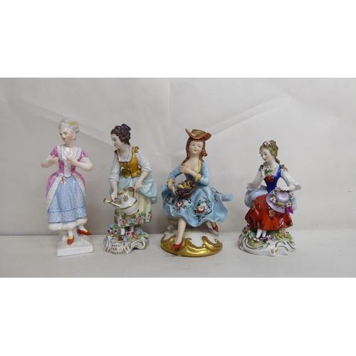 43 - Ten late 19th/mid 20thC European porcelain figures: to include ladies in period costume  largest 8