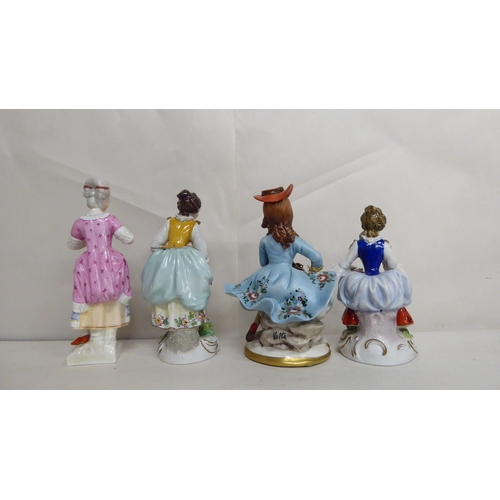 43 - Ten late 19th/mid 20thC European porcelain figures: to include ladies in period costume  largest 8