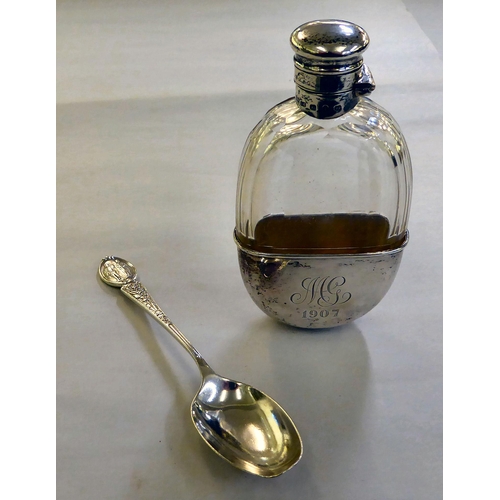 431 - A silver mounted and glass hip flask  Birmingham 1907; and a silver spoon  Birmingham 1923