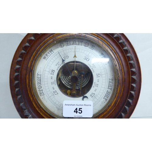 45 - A 1930s oak cased aneroid barometer  8