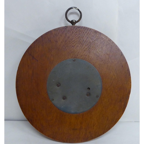 45 - A 1930s oak cased aneroid barometer  8