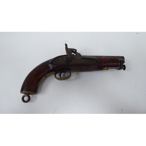 55 - A Tower 1849 percussion pistol with a walnut stock