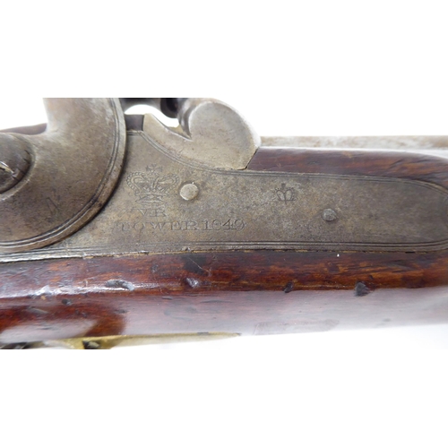 55 - A Tower 1849 percussion pistol with a walnut stock