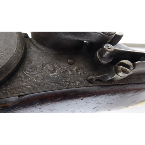 56 - A mid 19thC flintlock pistol with a walnut stock