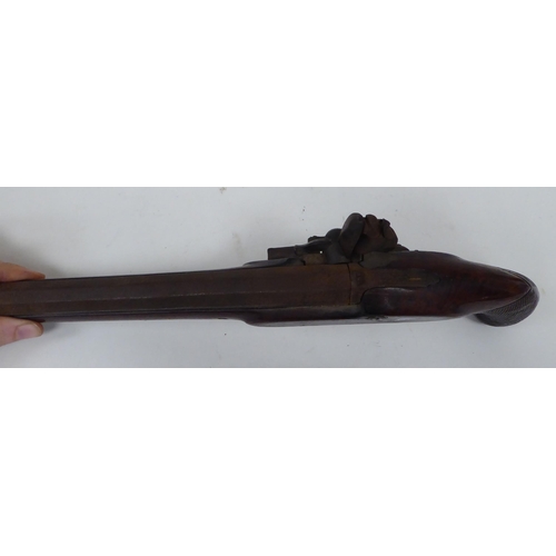 56 - A mid 19thC flintlock pistol with a walnut stock