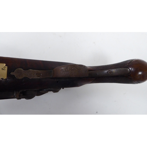 56 - A mid 19thC flintlock pistol with a walnut stock