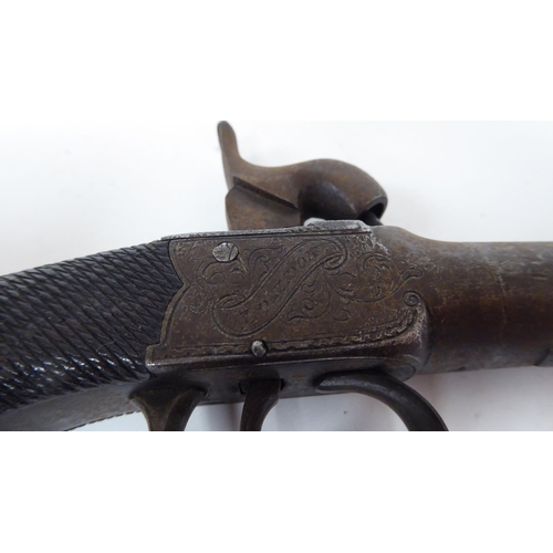 59 - An early 19thC Reilly percussion pocket pistol with a walnut stock