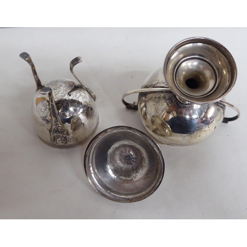 60 - A silver twin handled trophy; and a silver lidded sugar basin  mixed marks  (approx. gross 7ozs)