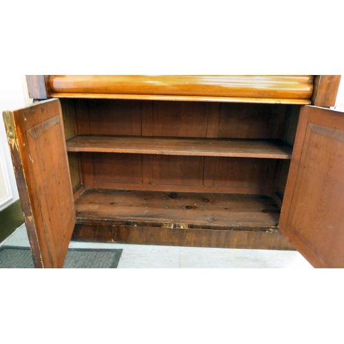 70 - A late Victorian mahogany finished cabinet bookcase, the upper section with two glazed doors, enclos... 