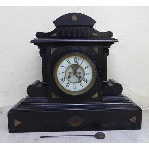 86 - A late Victorian slate cased mantel clock, on a plinth; the movement faced by a Roman dial  18