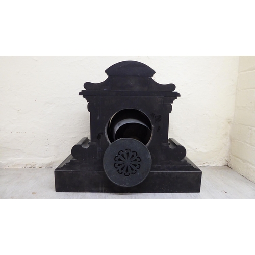 86 - A late Victorian slate cased mantel clock, on a plinth; the movement faced by a Roman dial  18