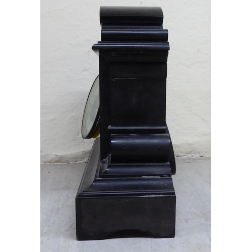 86 - A late Victorian slate cased mantel clock, on a plinth; the movement faced by a Roman dial  18