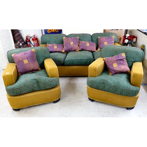 88 - An Art Deco inspired, two-tone fabric upholstered three piece suite, raised on block feet, comprisin... 