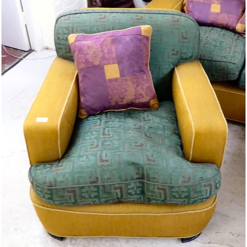 88 - An Art Deco inspired, two-tone fabric upholstered three piece suite, raised on block feet, comprisin... 