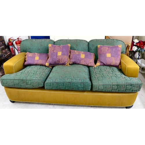 88 - An Art Deco inspired, two-tone fabric upholstered three piece suite, raised on block feet, comprisin... 