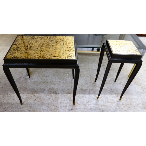 93 - Six pieces of modern furniture: to include a brass and steel framed coffee table with a black tinted... 