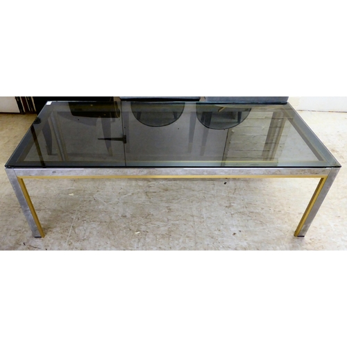 93 - Six pieces of modern furniture: to include a brass and steel framed coffee table with a black tinted... 