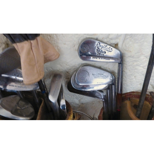 96 - Two bags of vintage golf clubs: to include woods and irons