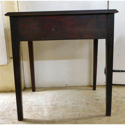 105 - A 19thC mahogany single drawer side table, raised on square, tapered legs  27